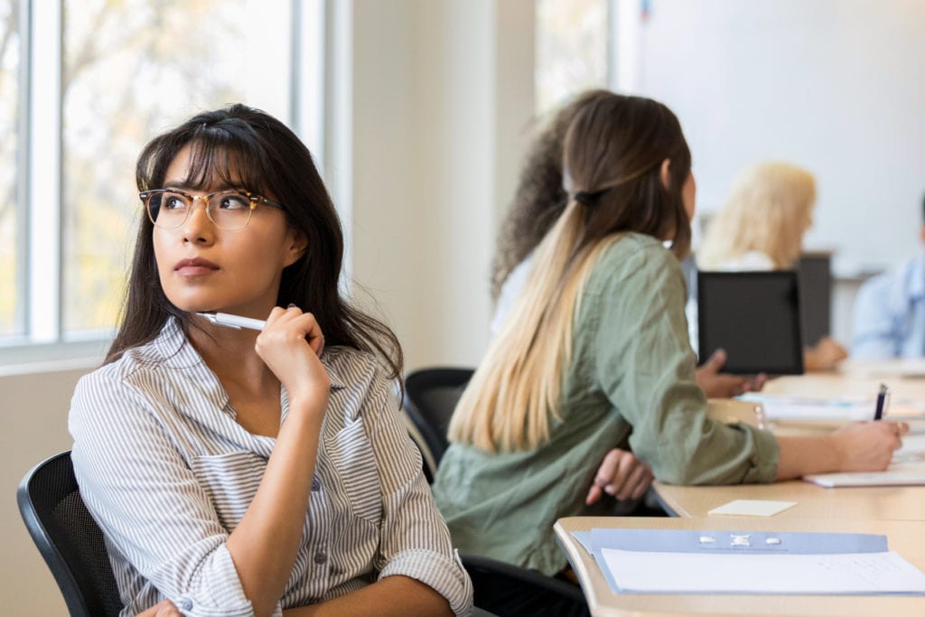 woman wondering if it's time to refinance student loans