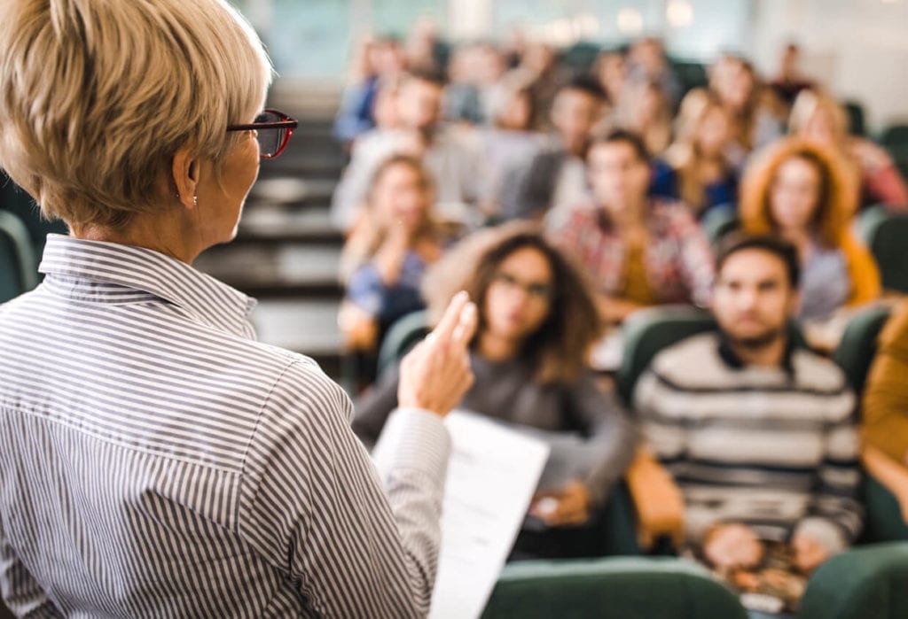 Professor teaching a college class