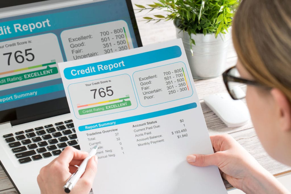 Woman holding credit report