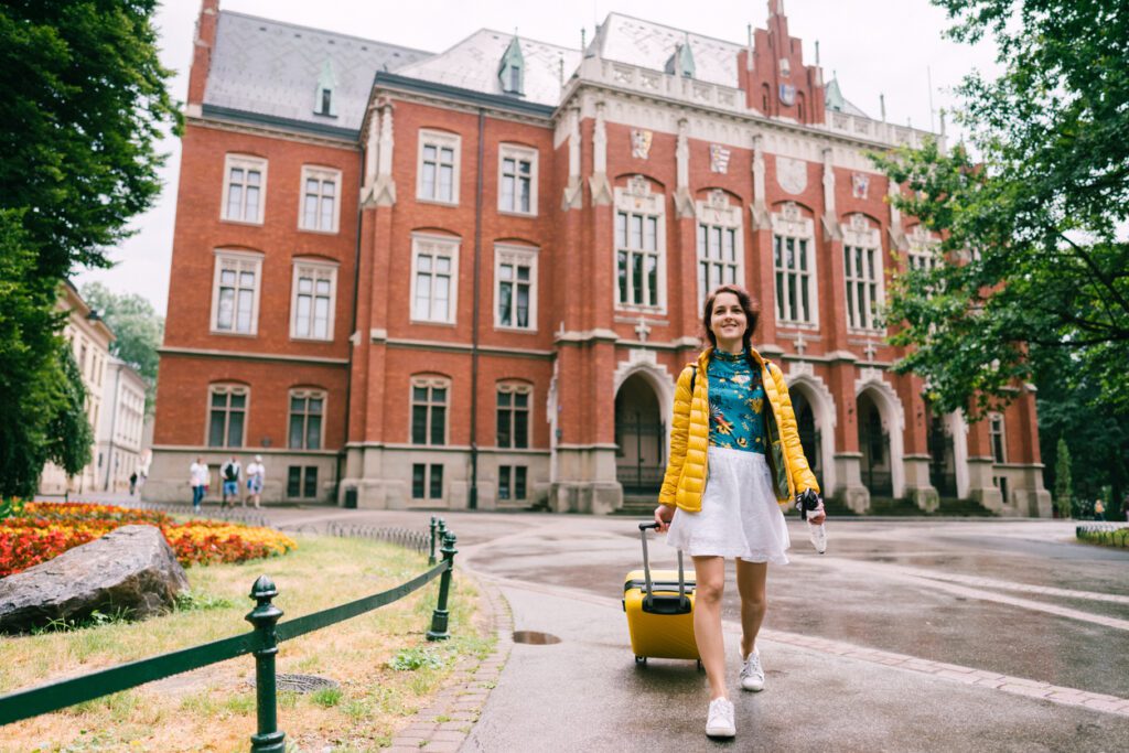 Student arriving to campus with suitcase