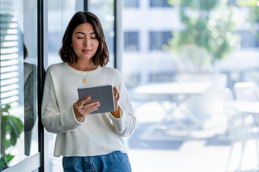 woman researching refinancing on tablet