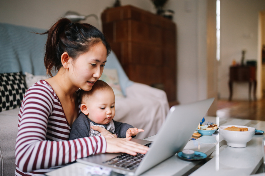 Asian woman looking at college savings for her child