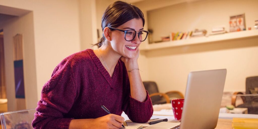 Female student looking at home much she can take out in student loans.