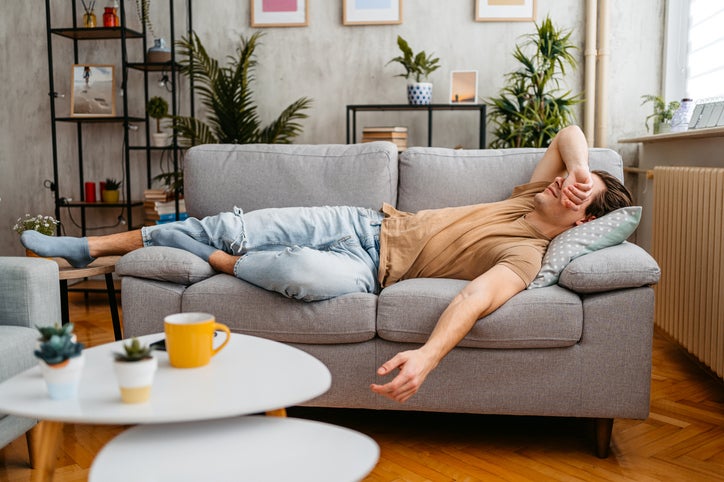 Man resting on couch