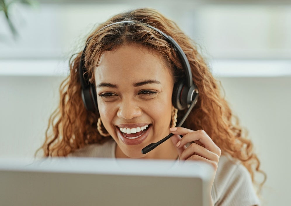 ELFI Student Loan Advisor assisting customer on the phone